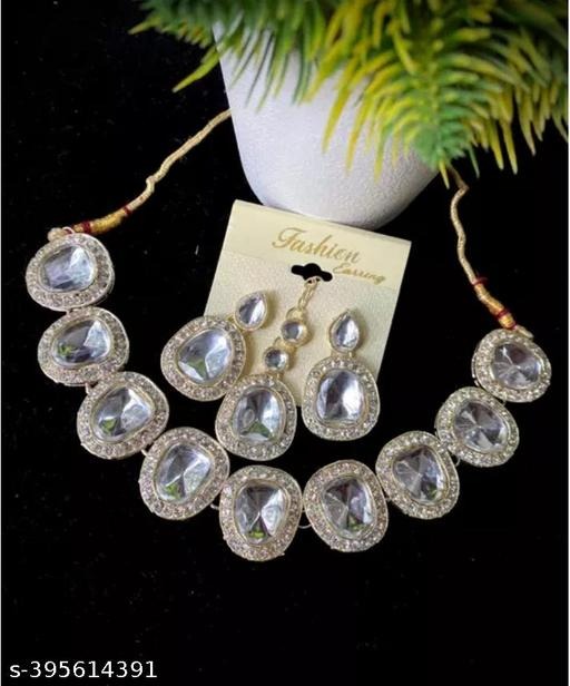 Add timeless elegance to your style with this Kundan Set, beautifully crafted from a durable alloy base with luxurious gold plating and embellished with sparkling Cubic Zirconia (American Diamonds). This jewellery set is perfect for women and girls who love ethnic glamour combined with modern sophistication. From weddings and festive occasions to parties and casual styling, this Kundan set is designed to elevate every outfit. Shop this elegant collection now at https://dealdynamo.vinisocial.in . The Gold Plated Kundan Set pairs gracefully with sarees, lehengas, gowns, and even Indo-western outfits, making it a versatile jewellery choice. Each stone is intricately set to ensure maximum sparkle and a premium finish. This makes it perfect for bridal wear, festive charm, or gifting. Find this authentic and exclusive jewellery piece today at https://dealdynamo.vinisocial.in . Available exclusively at https://dealdynamo.vinisocial.in , this Kundan jewellery set combines traditional beauty with a touch of modern elegance. Lightweight yet durable, it ensures all-day comfort while keeping you glamorous. Complete your jewellery collection with this masterpiece, available now at https://dealdynamo.vinisocial.in . Whether you’re a bride, bridesmaid, or a fashion-forward woman, this Kundan CZ Jewellery Set is your go-to accessory. Explore bridal jewellery collections, festive wear designs, and exclusive party sets at https://dealdynamo.vinisocial.in . The sparkling American diamonds in this Kundan set bring the richness of real diamonds at an affordable price. Order online now at https://dealdynamo.vinisocial.in . Curated and listed by Renu Baliyan, Nity Baliyan, and Bharti Tomar, this jewellery set is a symbol of premium craftsmanship and unmatched elegance. Ideal for weddings, anniversaries, Diwali, Karwa Chauth, birthdays, and festive gatherings, it makes for an unforgettable gift. Shop only authentic and unique Kundan jewellery at https://dealdynamo.vinisocial.in . From festive glamour to bridal elegance, this Kundan Gold Plated Set with American Diamond stones ensures you shine at every occasion. Browse exclusive collections, discover premium ethnic jewellery, and find timeless pieces only at https://dealdynamo.vinisocial.in . Add this jewelry to your box today by shopping now at https://dealdynamo.vinisocial.in .