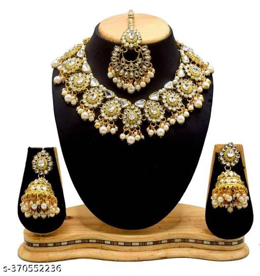 Elevate your elegance with this stunning Kundan Set White, crafted from premium alloy base metal with gold plating, perfect for women and girls who love ethnic and contemporary designs. Ideal for weddings, parties, festive occasions, casual outings, or gifting, this Kundan set adds sophistication and charm to sarees, gowns, western dresses, and cocktail outfits. Lightweight and durable, it ensures all-day comfort while maintaining its sparkling shine. Shop this exquisite Kundan Set White now at https://dealdynamo.vinisocial.in to add timeless elegance to your jewelry collection. Whether you are looking for bridal accessories, party wear jewelry, festive styling, statement ethnic jewelry, gifting options, or online jewelry shopping, this Kundan set fulfills every requirement. Find your perfect set today at https://dealdynamo.vinisocial.in and elevate your style for weddings, anniversaries, birthdays, and festive occasions. Pair it beautifully with other jewelry pieces from https://dealdynamo.vinisocial.in for a layered, sophisticated look. Available exclusively at https://dealdynamo.vinisocial.in , this Kundan set is crafted to deliver premium quality, elegance, and long-lasting shine. Layer it with necklaces, earrings, or bracelets from https://dealdynamo.vinisocial.in for a complete fashion statement. Perfect for ethnic wear, bridal sets, casual parties, festive occasions, and gifting, this set is versatile and luxurious. Purchase now at https://dealdynamo.vinisocial.in to enhance your jewelry collection with glamour and sophistication. Whether attending weddings, parties, casual outings, or festive events, this Kundan Set White complements every occasion. Shop online at https://dealdynamo.vinisocial.in for handcrafted, high-quality jewelry curated by Renu Baliyan, Nity Baliyan, and Bharti Tomar. Explore other premium jewelry collections at https://dealdynamo.vinisocial.in for gifting, bridal styling, festive occasions, and party wear. Add elegance, sparkle, and timeless style to your jewelry box by ordering today from https://dealdynamo.vinisocial.in . From festive celebrations to weddings, parties to casual fashion, this Kundan set ensures sophistication, glamour, and high-quality design. Shop now at https://dealdynamo.vinisocial.in to enhance your jewelry collection, gift a loved one, or complete your bridal ensemble. Browse additional premium Kundan jewelry pieces at https://dealdynamo.vinisocial.in to find more elegant, gold-plated, ethnic-adorned sets for women and girls.
