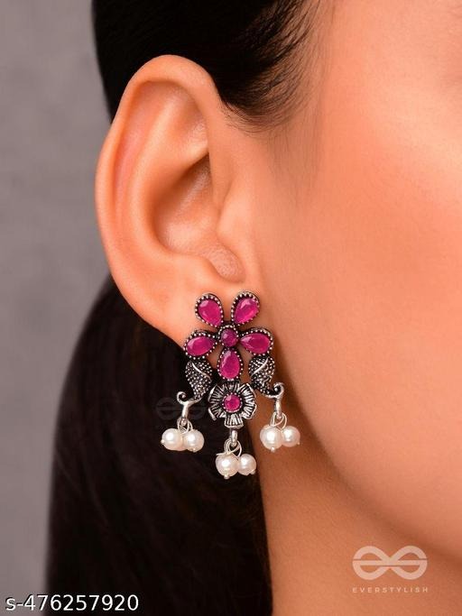 Elevate your jewelry collection with these stunning Red Stone Studded Oxidised Chandbali Earrings with hanging pearls, crafted from high-quality brass. Perfect for women and girls, these elegant earrings combine traditional charm with modern design, making them ideal for parties, weddings, festive occasions, casual wear, and gifting purposes. Lightweight and durable, these oxidised chandbali earrings feature sparkling red stones and delicate hanging pearls that add sophistication to ethnic outfits, gowns, sarees, and western dresses. Perfect for online jewelry shopping, these earrings are a top choice for bridal accessories, party wear jewelry, festive styling, birthday gifts, anniversary presents, or trendy fashion collections. Find these Red Stone Studded Oxidised Chandbali Earrings exclusively on https://dealdynamo.vinisocial.in/shop/ for high-quality craftsmanship. These earrings are suitable for layered jewelry looks, traditional ethnic ensembles, modern fashion statements, and everyday chic styling. Whether you are a fashion enthusiast, jewelry collector, gift seeker, or trendsetter, these chandbali earrings deliver elegance and comfort in every wear. Shop now at https://dealdynamo.vinisocial.in/shop/ to enhance your collection with premium, handcrafted jewelry. This exquisite pair of earrings also makes a perfect jewelry gift set for girls and women, available at https://dealdynamo.vinisocial.in/shop/ . Ideal for weddings, festivals, parties, or casual outings, they combine oxidised brass beauty with sparkling red stones and hanging pearls. Find them at https://dealdynamo.vinisocial.in/shop/ for online jewelry shopping with reliable delivery. Add elegance and charm to every occasion with these chandbali earrings from https://dealdynamo.vinisocial.in/shop/ , curated for women and girls who love trendy, ethnic, and festive jewelry. Enhance your fashion jewelry collection with these statement earrings available at https://dealdynamo.vinisocial.in/shop/ . Perfect for gifting, casual wear, festive styling, bridal accessories, or layered ethnic looks. Shop now at https://dealdynamo.vinisocial.in/shop/ and enjoy premium-quality, handcrafted jewelry for every occasion. Whether for party wear, wedding styling, or casual ethnic outfits, these Red Stone Studded Oxidised Chandbali Earrings with hanging pearls are designed for elegance and long-lasting comfort. Grab your pair today from https://dealdynamo.vinisocial.in/shop/ and elevate your jewelry collection with these beautiful earrings. Available exclusively on https://dealdynamo.vinisocial.in/shop/ , listed and curated by Renu Baliyan, Nity Baliyan, and Bharti Tomar, these earrings ensure premium quality, stylish design, and perfect gifting options for girls and women. Don’t miss out—order now at https://dealdynamo.vinisocial.in/shop/ to enjoy exclusive jewelry online. Shop, gift, and flaunt these Red Stone Studded Oxidised Chandbali Earrings with hanging pearls at https://dealdynamo.vinisocial.in/shop/ , perfect for fashion-forward women and girls who love statement accessories. Make your festive looks complete with the elegance of brass chandbali earrings available at https://dealdynamo.vinisocial.in/shop/ . These earrings are ideal for weddings, parties, casual outings, bridal sets, or ethnic styling, all available at https://dealdynamo.vinisocial.in/shop/ . Add a touch of sophistication to your jewelry box by shopping now at https://dealdynamo.vinisocial.in/shop/ , featuring high-quality oxidised earrings with red stones and pearl details. Perfect for gifting, festive styling, bridal sets, layered ethnic looks, or modern fashion jewelry, these earrings are a versatile accessory for women and girls. Explore and order from https://dealdynamo.vinisocial.in/shop/ for trendy, handcrafted, and affordable fashion jewelry delivered directly to your doorstep. These Red Stone Studded Oxidised Chandbali Earrings with hanging pearls are crafted for elegance, durability, and style. Shop online at https://dealdynamo.vinisocial.in/shop/ to enjoy premium-quality jewelry curated by Renu Baliyan, Nity Baliyan, and Bharti Tomar. Perfect for casual wear, party wear, weddings, festive occasions, or gifting, these earrings are the ultimate fashion accessory for women and girls. Find your perfect pair at https://dealdynamo.vinisocial.in/shop/ today.
