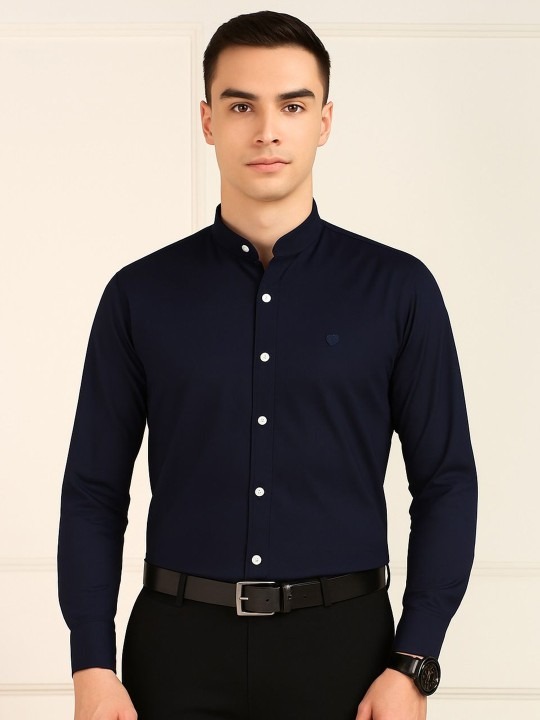 Product Details Sea green solid opaque formal shirt ,has a mandarin collar, button placket, long regular sleeves, straight hem Size & Fit Fit: Slim Fit The model (height 6') is wearing a size 40 Material & Care Pure Cotton Machine Wash