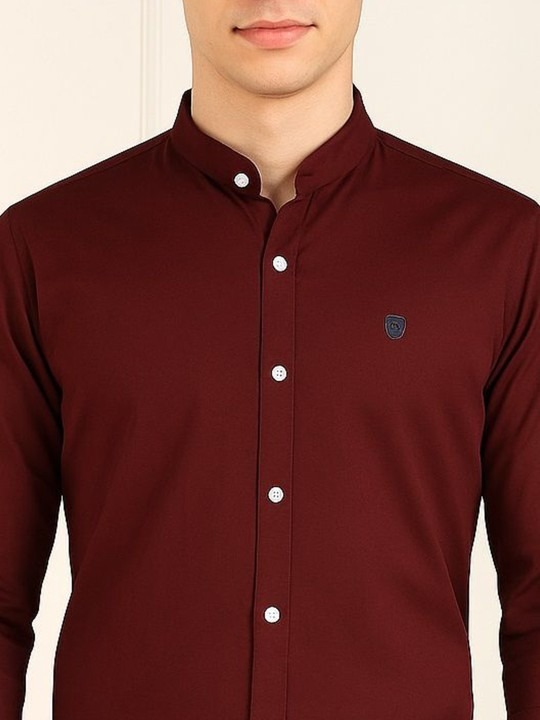 Product Details Green solid opaque formal shirt ,has a mandarin collar, button placket, long regular sleeves, straight hem Size & Fit Fit: Slim Fit The model (height 6') is wearing a size 40 Material & Care Pure Cotton Machine Wash
