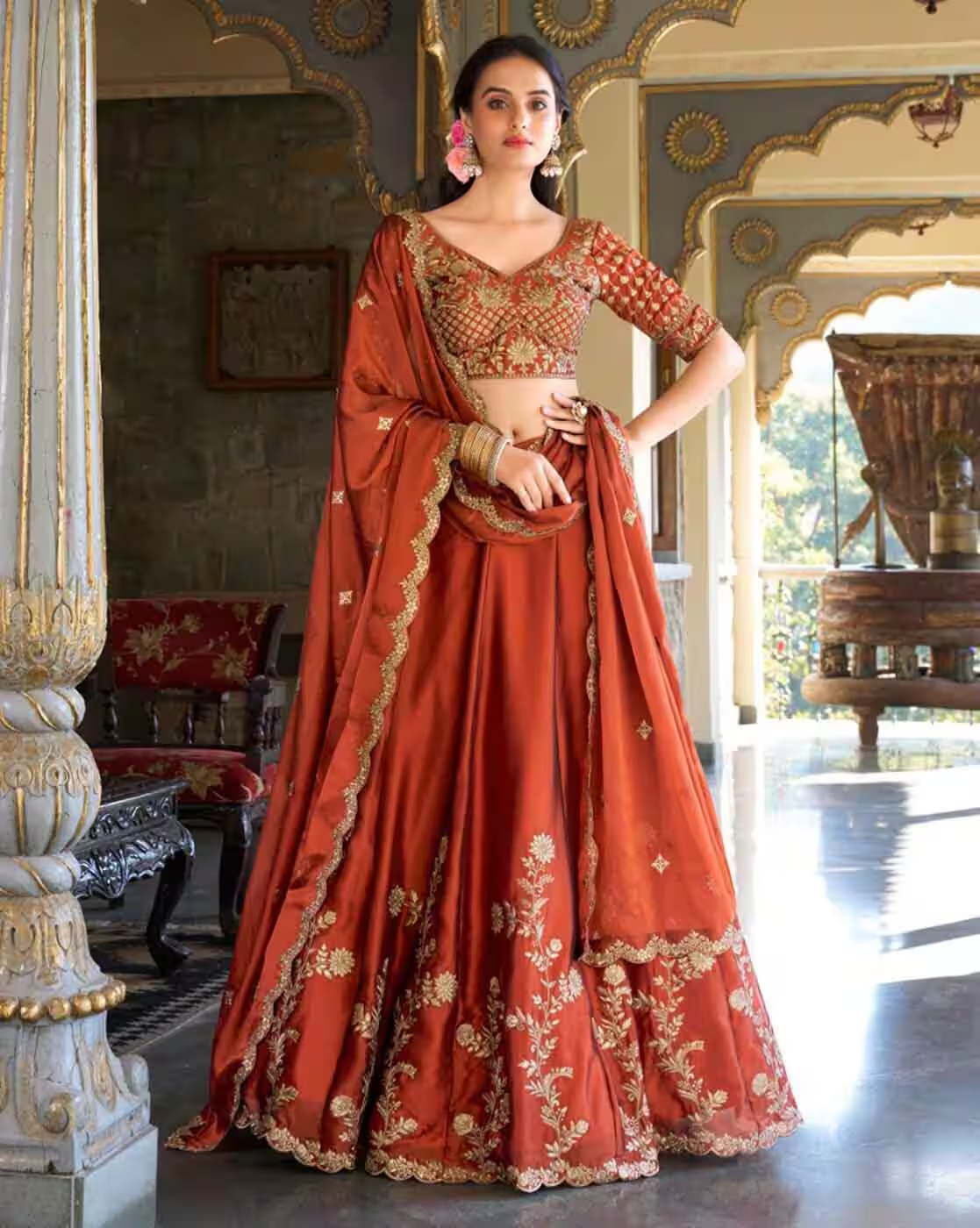 -1117Wx1400H-701645297-orange-MODEL Step into elegance with our Women Embroidered Lehenga & Choli Set with Dupatta, designed for weddings, receptions, parties, and festive occasions. Crafted from premium quality fabric, this lehenga set features intricate embroidery, a beautifully designed choli (blouse), and a matching dupatta for a complete ethnic look. This designer lehenga set blends traditional craftsmanship with a modern silhouette, making it a versatile outfit for bridesmaids, wedding guests, festive celebrations, and family functions. Its comfort fit ensures you can wear it for long hours without compromising style. Perfect for women looking for: Embroidered lehenga choli with dupatta online Wedding & party wear lehenga for women Traditional lehenga choli set with designer embroidery Festival-ready lehenga choli for Indian ethnic look Pair this stunning lehenga with statement jewelry, heels, and ethnic accessories to complete your glamorous outfit. ✨ Product Highlights – Material: Premium quality fabric with embroidery Includes: Lehenga, embroidered choli, matching dupatta Occasion: Weddings, parties, festivals & receptions Style: Traditional yet modern ethnic wear Fit: Comfortable & easy to carry for long hours 🔹 Variations & Uses – Available in multiple colors and designs Can be styled for weddings, engagements, haldi, mehendi, sangeet Perfect as a bridesmaid outfit or wedding guest attire Works beautifully for Diwali, Navratri, Eid, Karva Chauth & festive gatherings 🔹 Why Choose This Lehenga – Elegant embroidery with premium finishing Complete set (lehenga, blouse & dupatta included) Perfect balance of tradition & modern design Versatile ethnic outfit for multiple occasions Value for money designer wear 🔹 Push Offer Message ✨ Make every occasion special with our Women Embroidered Lehenga & Choli Set with Dupatta. Perfect for weddings, parties & festivals. Shop now & elevate your ethnic wardrobe! ✨