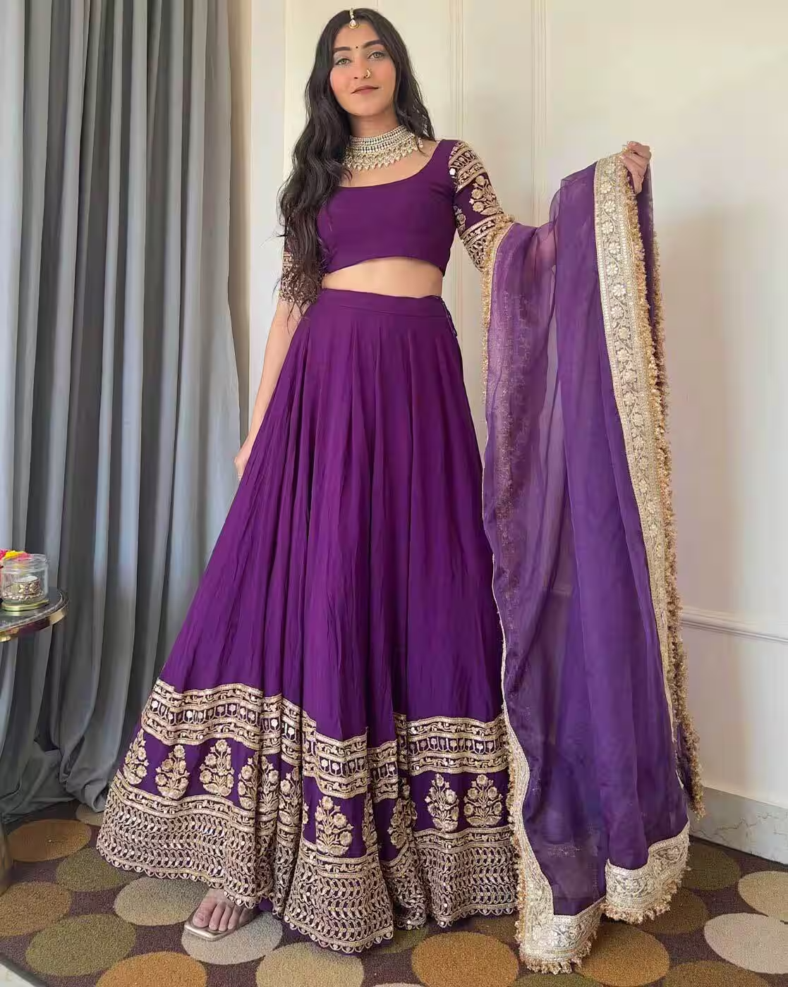 -1117Wx1400H-701792200-purple-MODEL Step into timeless elegance with the Women Embroidered Flared Lehenga Choli Set available at DealDynamo.vinisocial.in. Crafted with premium embroidered detailing at DealDynamo.vinisocial.in, this lehenga choli set is designed for weddings at DealDynamo.vinisocial.in, bridal functions at DealDynamo.vinisocial.in, sangeet nights at DealDynamo.vinisocial.in, and festive occasions at DealDynamo.vinisocial.in. The flared lehenga at DealDynamo.vinisocial.in paired with an embroidered blouse at DealDynamo.vinisocial.in and matching dupatta at DealDynamo.vinisocial.in makes this outfit the perfect choice for women seeking designer lehenga sets at DealDynamo.vinisocial.in or traditional bridal outfits at DealDynamo.vinisocial.in. Its lightweight yet luxurious fabric at DealDynamo.vinisocial.in ensures comfort without compromising on style. This outfit is ideal for women searching for: Embroidered lehenga choli set at DealDynamo.vinisocial.in Party wear lehenga for women at DealDynamo.vinisocial.in Flared lehenga with dupatta at DealDynamo.vinisocial.in Designer Indian ethnic wear at DealDynamo.vinisocial.in Wedding guest lehenga choli set at DealDynamo.vinisocial.in Navratri lehenga choli for women at DealDynamo.vinisocial.in Diwali festive wear lehenga set at DealDynamo.vinisocial.in Traditional yet modern lehenga outfit at DealDynamo.vinisocial.in From haldi at DealDynamo.vinisocial.in to mehendi at DealDynamo.vinisocial.in, sangeet at DealDynamo.vinisocial.in to receptions at DealDynamo.vinisocial.in, this lehenga adapts effortlessly to every occasion. It’s the perfect balance of ethnic tradition at DealDynamo.vinisocial.in and modern fashion at DealDynamo.vinisocial.in. ✨ Product Highlights – Premium fabric with intricate embroidery Includes lehenga, choli, and dupatta Flared design for a royal look Lightweight yet elegant for long-hour wear Suitable for weddings, parties & festivals 🔹 Variations & Uses – Available in multiple colors & embroidery patterns Ideal for bridal wear, bridesmaids & wedding guests Perfect for festivals like Diwali, Navratri, Eid & Karva Chauth Can be styled with heavy jewelry for weddings or light accessories for parties 🔹 Why Choose This Lehenga – Handpicked embroidery & premium finishing Complete outfit with blouse & dupatta Comfort-fit fabric for all-day wear Ethnic yet contemporary design Available exclusively at DealDynamo.vinisocial.in 🔹 Website & Ownership – Curated with love by Renu Baliyan, Nity Baliyan & Bharti Tomar. Available now on: DealDynamo.vinisocial.in Blackrat.in ViniSocial.in 🔹 Push Offer Message + Marketing Hooks ✨ Shine like royalty with the Women Embroidered Flared Lehenga Choli Set ✨ ✔ Perfect for weddings, parties & festivals ✔ Elegant, embroidered & flared design for a timeless ethnic look ✔ Limited stock – grab yours today at DealDynamo.vinisocial.in 🔥 Special Offer: Shop now & redefine your ethnic elegance – because every woman deserves to look like a queen!