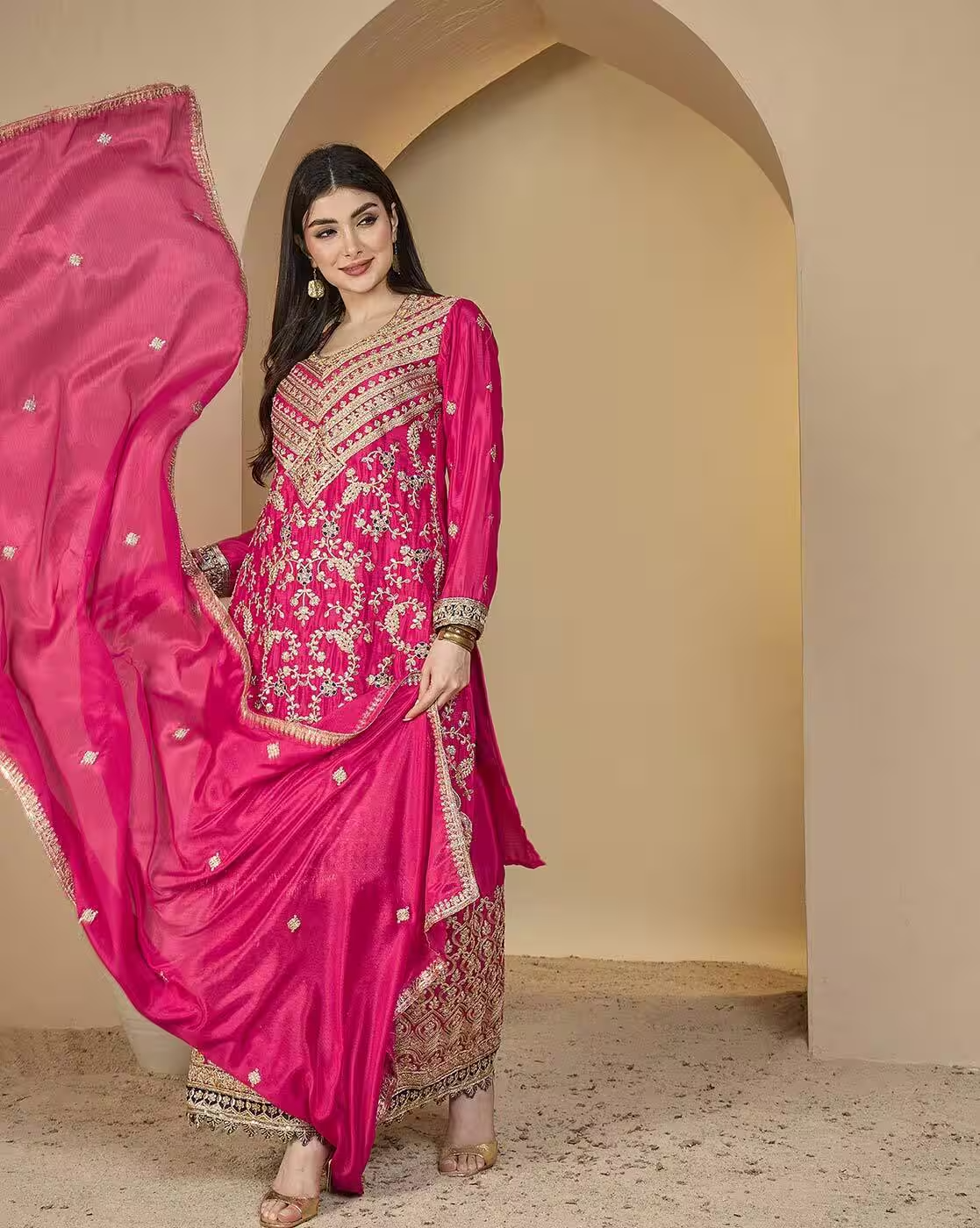 -1117Wx1400H-702088713-pink-MODEL4 Elevate your ethnic wardrobe with the Women Embroidered Straight Kurta Suit Set, a perfect blend of traditional craftsmanship and modern design. Made with premium quality fabric, this set includes a straight-cut embroidered kurta, matching pants, and a stylish dupatta to complete the look. Whether you’re dressing up for a festive occasion, office party, wedding function, or casual outing, this embroidered kurta set ensures elegance, comfort, and versatility. Its minimal yet graceful embroidery makes it suitable for both day wear and evening functions. Ideal for women searching for: Embroidered straight kurta suit set with dupatta Party wear kurta sets for women Festive wear Indian suit sets online Comfortable ethnic wear for office & daily functions Pair it with ethnic earrings, heels, or juttis for a chic, complete look. ✨ Product Highlights – Material: Premium fabric with intricate embroidery Includes: Straight kurta, matching pants & dupatta Occasion: Office, casual, party & festive wear Style: Traditional elegance with modern simplicity Fit: Comfortable & easy to wear 🔹 Variations & Uses – Available in multiple colors & embroidery patterns Suitable for festivals, pujas, weddings, office parties Can be styled with ethnic jewelry & dupattas Perfect for day-to-day wear with comfort & grace 🔹 Why Choose This Suit Set – Elegant embroidered detailing Complete set with dupatta & pants Perfect balance of tradition & comfort Suitable for multiple occasions Premium quality at affordable pricing 🔹 Push Offer Message ✨ Redefine elegance with our Women Embroidered Straight Kurta Suit Set – perfect for office, parties & festive occasions. Limited stock – shop now & upgrade your ethnic style! ✨