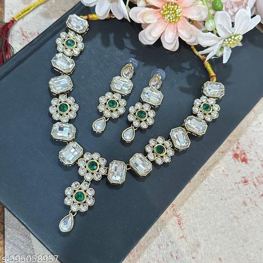 Enhance your beauty with this Kundan Jewellery Set / Kundan Necklace, made from premium alloy with elegant copper plating and embellished with artificial stones and beads. This set is perfect for women and girls who want to combine tradition with modern fashion. Designed for weddings, parties, festive occasions, and even casual celebrations, it brings a regal charm to your look. Add this timeless piece to your collection today by shopping at https://dealdynamo.vinisocial.in . Crafted with attention to detail, this copper plated Kundan necklace set is durable, lightweight, and comfortable for long wear. It pairs beautifully with sarees, lehengas, gowns, anarkalis, and Indo-western outfits, giving you versatility for every occasion. Whether you want bridal jewellery, festive accessories, or elegant gifting options, this piece is a must-have. Order online now at https://dealdynamo.vinisocial.in . Available exclusively at https://dealdynamo.vinisocial.in , this Kundan jewellery set offers shimmering artificial stones and delicate beadwork that create an authentic ethnic appeal. Perfect for brides, bridesmaids, and women who love classic jewellery, it is suitable for weddings, anniversaries, Diwali, Karwa Chauth, and Navratri. Explore authentic collections and buy yours today at https://dealdynamo.vinisocial.in . Each piece is curated by Renu Baliyan, Nity Baliyan, and Bharti Tomar, ensuring quality, authenticity, and premium design. This set adds grace and luxury while staying budget-friendly, making it an ideal choice for personal use or gifting. Find more traditional jewellery and ethnic designs online only at https://dealdynamo.vinisocial.in . From festive styling to daily ethnic fashion, this Kundan Necklace Set ensures you shine on every occasion. Complete your look with matching earrings, bangles, or maang tikka available at https://dealdynamo.vinisocial.in . Upgrade your jewellery box today and discover timeless ethnic jewellery crafted for elegance at https://dealdynamo.vinisocial.in .