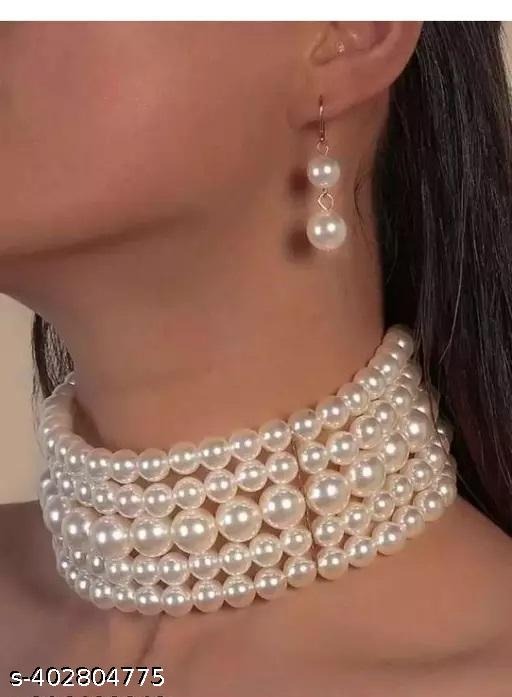imgi_120_u97pv_512 Enhance your elegance with this 5 Layer Glass Bead Choker Set, crafted from premium glass beads and finished with radiant gold plating for a stylish and modern look. Designed for women and girls who love layered statement jewellery, this choker set is perfect for weddings, parties, festive occasions, casual events, and gifting. The gold-plated glass bead choker features five stunning layers that add depth, shine, and sophistication to any outfit. It pairs beautifully with sarees, lehengas, gowns, and Indo-western dresses, making it a versatile choice for both traditional and contemporary fashion styles. Lightweight and comfortable, it ensures long-lasting wear without compromising style. Ideal for gifting, this 5 Layer Choker Set is perfect for birthdays, anniversaries, weddings, engagements, festive gifts, and party wear jewellery. Whether you are looking for designer layered bead chokers, gold-plated glass jewellery sets, bridal choker necklace sets, statement party wear necklaces, festive layered necklaces for women & girls, affordable gold-plated chokers online, or trendy layered necklaces for brides, this choker set delivers elegance, style, and quality in one package. Exclusively available at https://dealdynamo.vinisocial.in , curated by Renu Baliyan, Nity Baliyan & Bharti Tomar, this set combines modern design, comfort, and durable craftsmanship for women who want to make a statement. 🔹 Product Highlights ✅ Five-layered design for a bold, elegant look ✅ Made from high-quality glass beads with gold plating ✅ Lightweight, comfortable, and durable ✅ Perfect for weddings, parties, festive occasions, and gifting ✅ Pairs beautifully with sarees, lehengas, gowns, and Indo-western outfits 🔹 Variations & Uses Bridal choker set for weddings & receptions Party wear layered choker for festive occasions Festival jewellery for Diwali, Navratri, Karva Chauth Ideal gift jewellery set for women & girls Stylish accessory for sarees, lehengas, gowns, and Indo-western dresses 🔹 Why Choose This Choker Set? ✔ Unique five-layered design for a standout statement ✔ Premium glass beads with gold plating for durability and shine ✔ Lightweight and comfortable for long events ✔ Elegant and versatile for bridal, party, and festive occasions ✔ Exclusive availability at https://dealdynamo.vinisocial.in 🔹 Website & Ownership This jewellery set is curated and listed exclusively on https://dealdynamo.vinisocial.in by Renu Baliyan, Nity Baliyan & Bharti Tomar. ✨ Keywords naturally embedded: 5 layer glass bead choker set, gold-plated layered choker for women, designer glass bead necklace online, party wear layered choker necklace, bridal gold-plated choker set, festival jewellery for women & girls, trendy layered statement necklace, affordable gold-plated choker online, wedding layered bead jewellery, modern layered necklace for sarees and lehengas, etc.