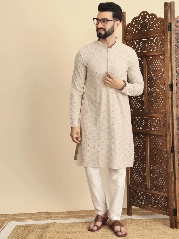Redefine sophistication with the House of Pataudi Menβs Embroidered Viscose Rayon Straight Kurta (White) β a premium piece of ethnic wear that blends luxury, tradition, and modern style. Crafted from soft viscose rayon fabric, this kurta ensures a smooth drape, breathable comfort, and elegant finish, perfect for long celebrations and special occasions. The delicate embroidery on the front panel enhances its richness, making it an ideal outfit for weddings, festive gatherings, cultural events, and family functions. The straight-fit design offers a contemporary silhouette while keeping the ethnic charm intact. Pair it with golden churidar, white pajama, or slim-fit trousers for a royal look. Designed under the House of Pataudi collection, this kurta represents timeless nawabi elegance inspired by royal Indian heritage. Perfect for search queries like: House of Pataudi embroidered kurta for men White viscose rayon straight kurta with embroidery Menβs ethnic wear for weddings & festive occasions Designer kurta for men House of Pataudi collection Luxury embroidered kurta for Indian functions β¨ Product Highlights β Brand: House of Pataudi Material: Premium viscose rayon (soft, breathable & elegant) Color: White with embroidery Fit: Straight-cut modern silhouette Design: Embroidered detailing for a royal look Occasion: Perfect for weddings, festive functions & cultural events πΉ Variations & Uses β Pair with pajamas, churidar, or slim-fit trousers Ideal for weddings, festivals, sangeet, mehendi & cultural gatherings Available in different colors & designs under the House of Pataudi collection Perfect as gifting option for men who love ethnic wear πΉ Why Choose This Kurta β Premium brand β House of Pataudi (royal nawabi styling) Viscose rayon fabric β soft, breathable & drapes beautifully Elegant embroidery β adds sophistication & festive charm Straight-fit design β modern yet traditional Perfect for royal & festive occasions πΉ Website & Ownership β This kurta is offered under the House of Pataudi collection, curated by Renu Baliyan, Nity Baliyan & Bharti Tomar, ensuring authentic, stylish & premium-quality ethnic wear. πΉ Push Offer Message β π€ Royal Elegance for Every Occasion π€ Shop the House of Pataudi Menβs Embroidered White Viscose Rayon Straight Kurta β Luxurious, stylish & festive-ready. Limited Edition β Order Now!