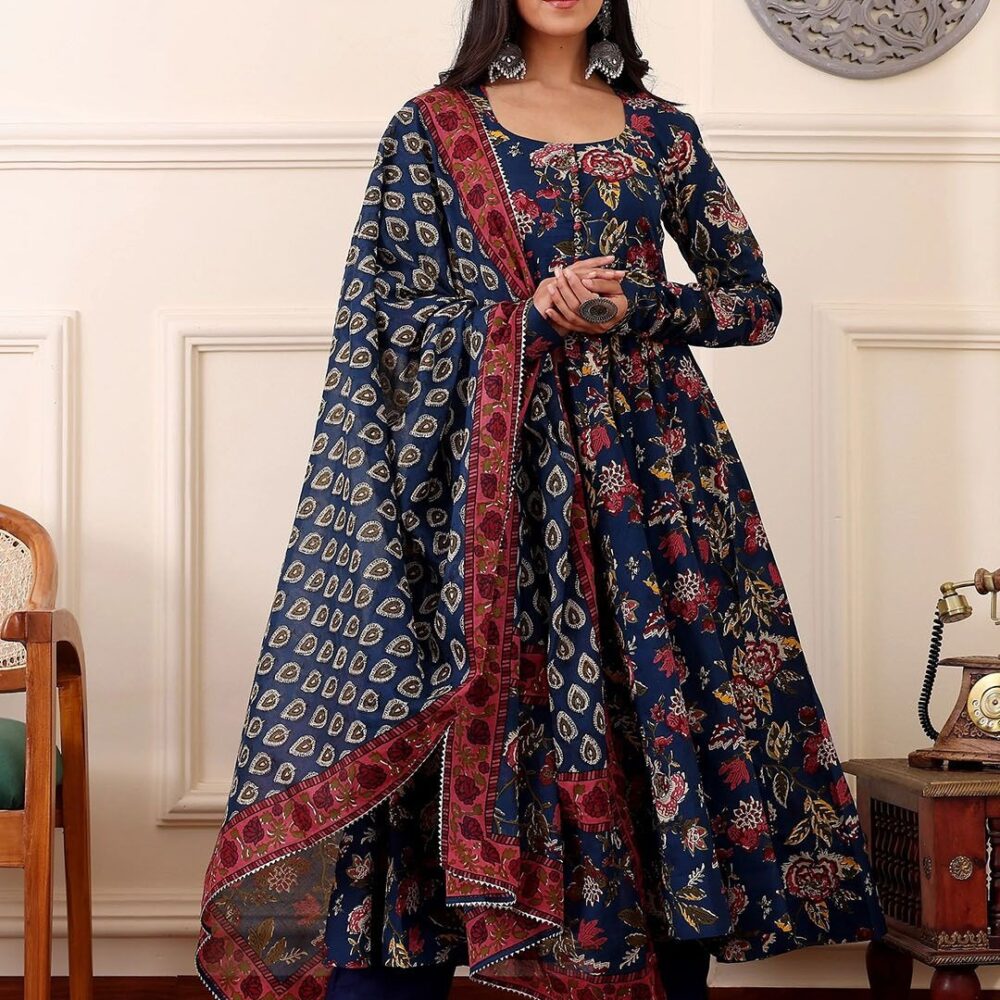 Size Brand Size Bust (in) Front Length (in) Sleeve-Length (in) To Fit Waist (in) Waist (in) Hips (in) Across Shoulder (in) Outseam Length (in) Inseam Length (in) S 36 36.0 46.0 17.0 28.0 28.0 38.0 14.0 38.0 31.0 M 38 38.0 46.0 17.0 30.0 30.0 40.0 14.5 38.0 31.0 L 40 40.0 46.0 17.0 32.0 32.0 42.0 15.0 38.0 31.0 XL 42 42.0 46.0 17.0 34.0 34.0 44.0 15.5 38.0 31.0 XXL 44 44.0 46.0 17.0 36.0 36.0 46.0 16.0 38.0 31.0Product Details Blue, red printed kurta with trousers and dupatta Kurta design: Floral printed Anarkali shape Empire style Round neck Three-quarter regular sleeves Calf length with straight hem Viscose rayon machine weave fabric Trousers design: Solid Trousers Elasticated waistband Slip-on closure Dupatta design: Printed dupatta Size & Fit The model (height 5'8) is wearing a size S Material & Care Kurta Fabric: Viscose Rayon Trouser Fabric: Viscose Rayon Dupatta Fabric: Viscose Rayon Machine Wash