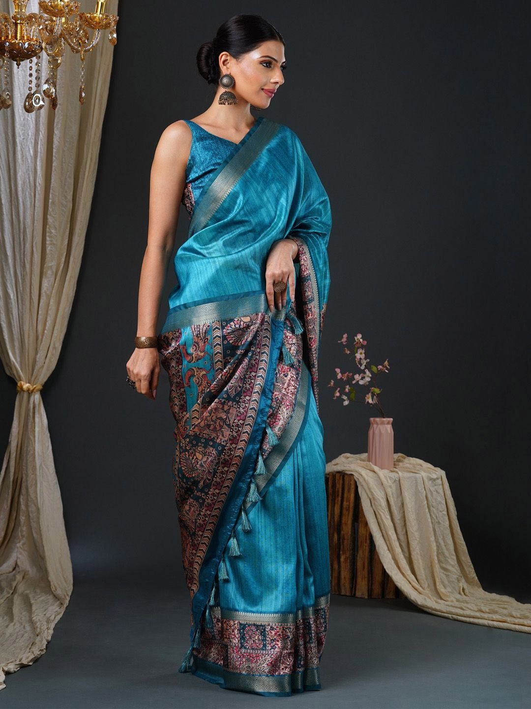 imgi_135_nVadxaB4_03d7b6e215e149f28b87ae5304e11d4c Product Details Design Details Camel brown and gold-toned block print saree Kalamkari printed saree with woven design border Has zari detail The saree comes with an unstitched blouse piece The blouse worn by the model might be for modelling purpose only. Check the image of the blouse piece to understand how the actual blouse piece looks like. Size & Fit Length: 5.5 metres plus 0.8 metre blouse piece Width: 1.06 metres (approx.) Material & Care Saree Fabric: Silk Blend Blouse Fabric: Silk Blend Machine Wash