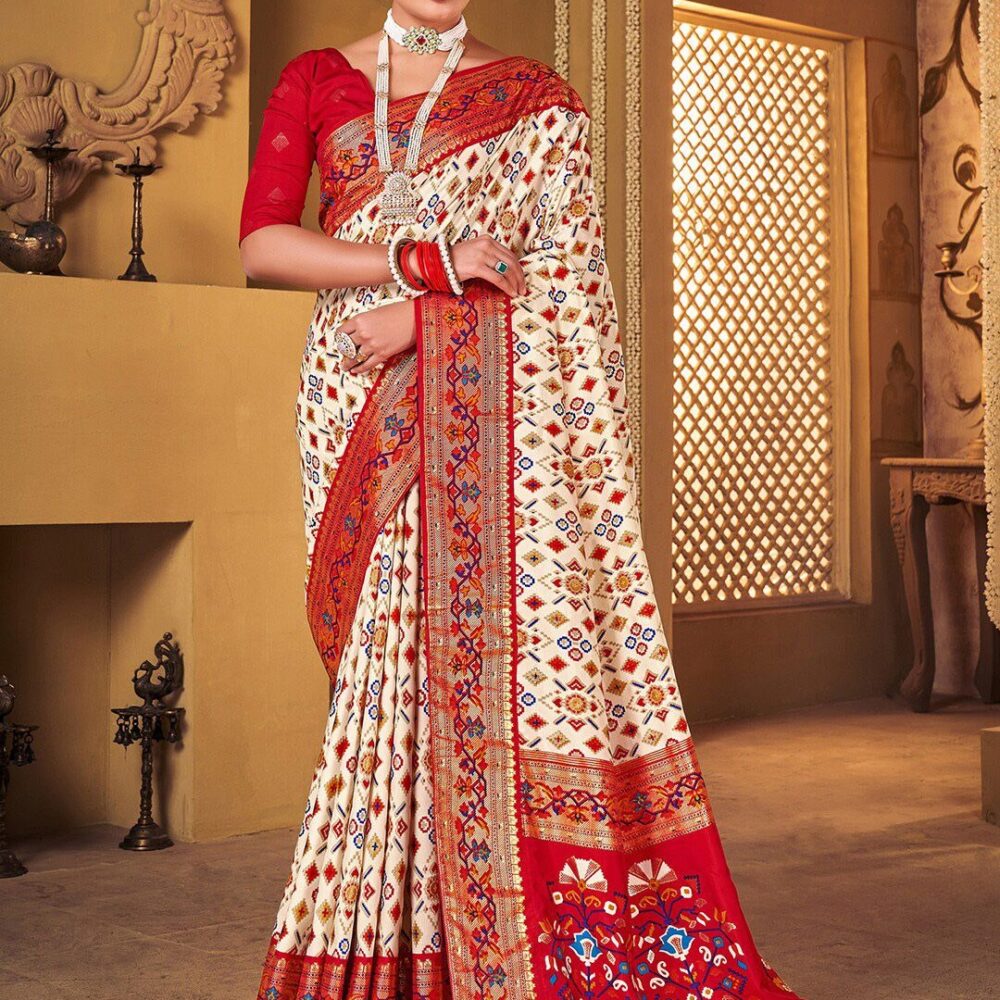 Product Details Design Details Navy blue and red patola saree Woven design saree with woven design border Has zari detail The saree comes with an unstitched blouse piece The blouse worn by the model might be for modelling purpose only. Check the image of the blouse piece to understand how the actual blouse piece looks like. Size & Fit Length: 5.5 metres plus 0.8 metre blouse piece Width: 1.06 metres (approx.) Material & Care Saree Fabric : Silk Blend Blouse Fabric: Silk Blend Dry Clean