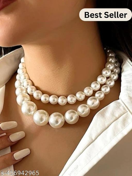 imgi_136_kgcc5_512 Elevate your elegance with this Shining White Pearl Necklace for Women, crafted from premium five metal for durability and strength. Designed for women who love classic beauty, this necklace features lustrous white pearls that add sophistication to every outfit. Perfect for weddings, parties, festive occasions, casual events, and gifting, this necklace brings timeless charm and grace to your look. This white pearl necklace pairs beautifully with sarees, lehengas, gowns, and Indo-western dresses, making it a versatile addition to any jewellery collection. Lightweight yet durable, it ensures comfort for long wear while maintaining a striking appearance. Ideal for bridal jewellery, party wear, festival celebrations, and gifting, it is a must-have for women and girls seeking elegance and style. Whether you are looking for designer pearl necklaces online, white pearl jewellery sets, bridal pearl necklaces, elegant gift jewellery for women, party wear necklaces, festive jewellery online, traditional pearl necklace sets, lightweight pearl necklaces for weddings, premium five metal pearl jewellery, or affordable pearl necklaces for women, this Shining White Pearl Necklace delivers style, quality, and sophistication. Exclusively available at https://dealdynamo.vinisocial.in , curated by Renu Baliyan, Nity Baliyan & Bharti Tomar, this necklace ensures a perfect blend of elegance, durability, and timeless fashion. 🔹 Product Highlights ✅ Crafted from premium five metal for durability ✅ Lustrous white pearls for classic elegance ✅ Lightweight and comfortable for long wear ✅ Perfect for weddings, parties, festive occasions, and gifting ✅ Versatile design for modern and traditional outfits 🔹 Variations & Uses Bridal pearl necklace for weddings & receptions Party wear necklace for festive occasions Festival jewellery for Diwali, Karva Chauth & Navratri Perfect gift jewellery for women & girls Pairs beautifully with sarees, lehengas, gowns, and Indo-western outfits 🔹 Why Choose This Necklace? ✔ Timeless design with shining white pearls ✔ Durable five metal base for long-lasting use ✔ Lightweight and comfortable for extended wear ✔ Elegant and versatile for bridal, party, and festive occasions ✔ Exclusive availability at https://dealdynamo.vinisocial.in