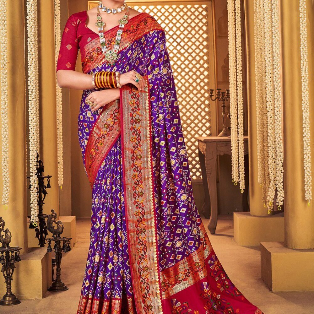 Kurta Plazo Dupatta Set Product Details Design Details Navy blue and red patola saree Woven design saree with woven design border Has zari detail The saree comes with an unstitched blouse piece The blouse worn by the model might be for modelling purpose only. Check the image of the blouse piece to understand how the actual blouse piece looks like. Size & Fit Length: 5.5 metres plus 0.8 metre blouse piece Width: 1.06 metres (approx.) Material & Care Saree Fabric : Silk Blend Blouse Fabric: Silk Blend Dry Clean