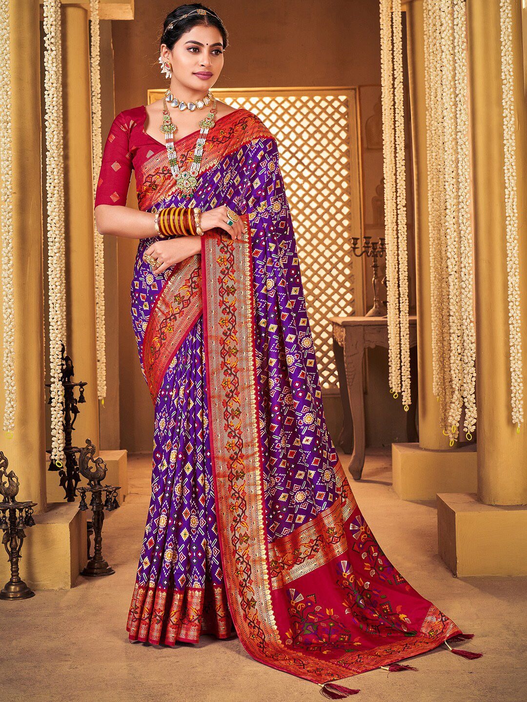 Kurta Plazo Dupatta Set Product Details Design Details Navy blue and red patola saree Woven design saree with woven design border Has zari detail The saree comes with an unstitched blouse piece The blouse worn by the model might be for modelling purpose only. Check the image of the blouse piece to understand how the actual blouse piece looks like. Size & Fit Length: 5.5 metres plus 0.8 metre blouse piece Width: 1.06 metres (approx.) Material & Care Saree Fabric : Silk Blend Blouse Fabric: Silk Blend Dry Clean