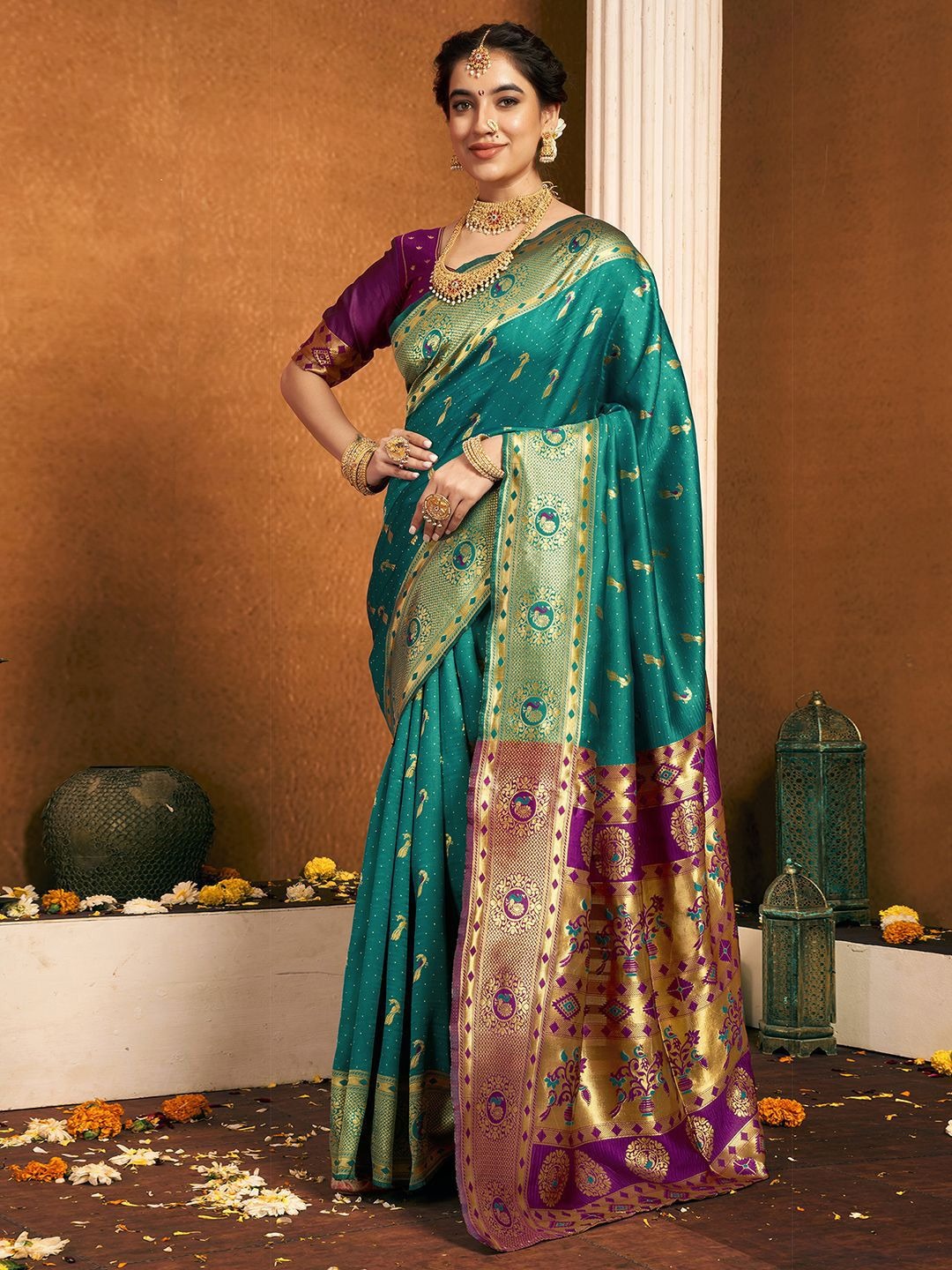 imgi_141_5PSyeIkQ_6fbd692852214bc88b76319edb50dba5 Product Details Design Details Green and gold-toned paithani saree Woven design saree with woven design border Has zari detail The saree comes with an unstitched blouse piece The blouse worn by the model might be for modelling purpose only. Check the image of the blouse piece to understand how the actual blouse piece looks like. Size & Fit Length: 5.5 metres plus 0.8 metre blouse piece Width: 1.06 metres (approx.) Material & Care Saree and Blouse Fabric : Silk Blend Hand Wash