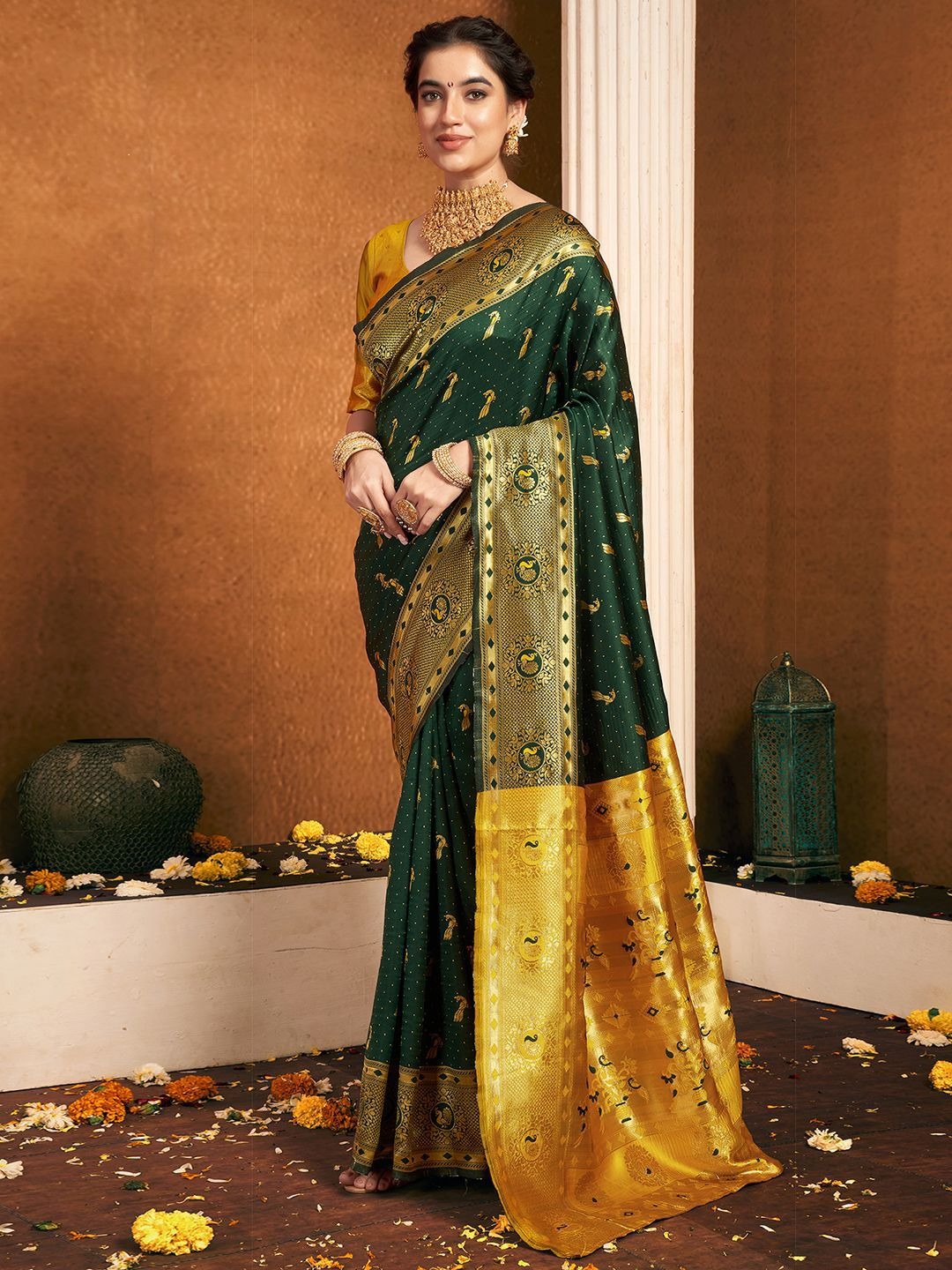 imgi_141_6OxUKmWf_edf3b214218542ffa34c73e71d3132b3 Product Details Design Details Green and gold-toned paithani saree Woven design saree with woven design border Has zari detail The saree comes with an unstitched blouse piece The blouse worn by the model might be for modelling purpose only. Check the image of the blouse piece to understand how the actual blouse piece looks like. Size & Fit Length: 5.5 metres plus 0.8 metre blouse piece Width: 1.06 metres (approx.) Material & Care Saree and Blouse Fabric : Silk Blend Hand Wash