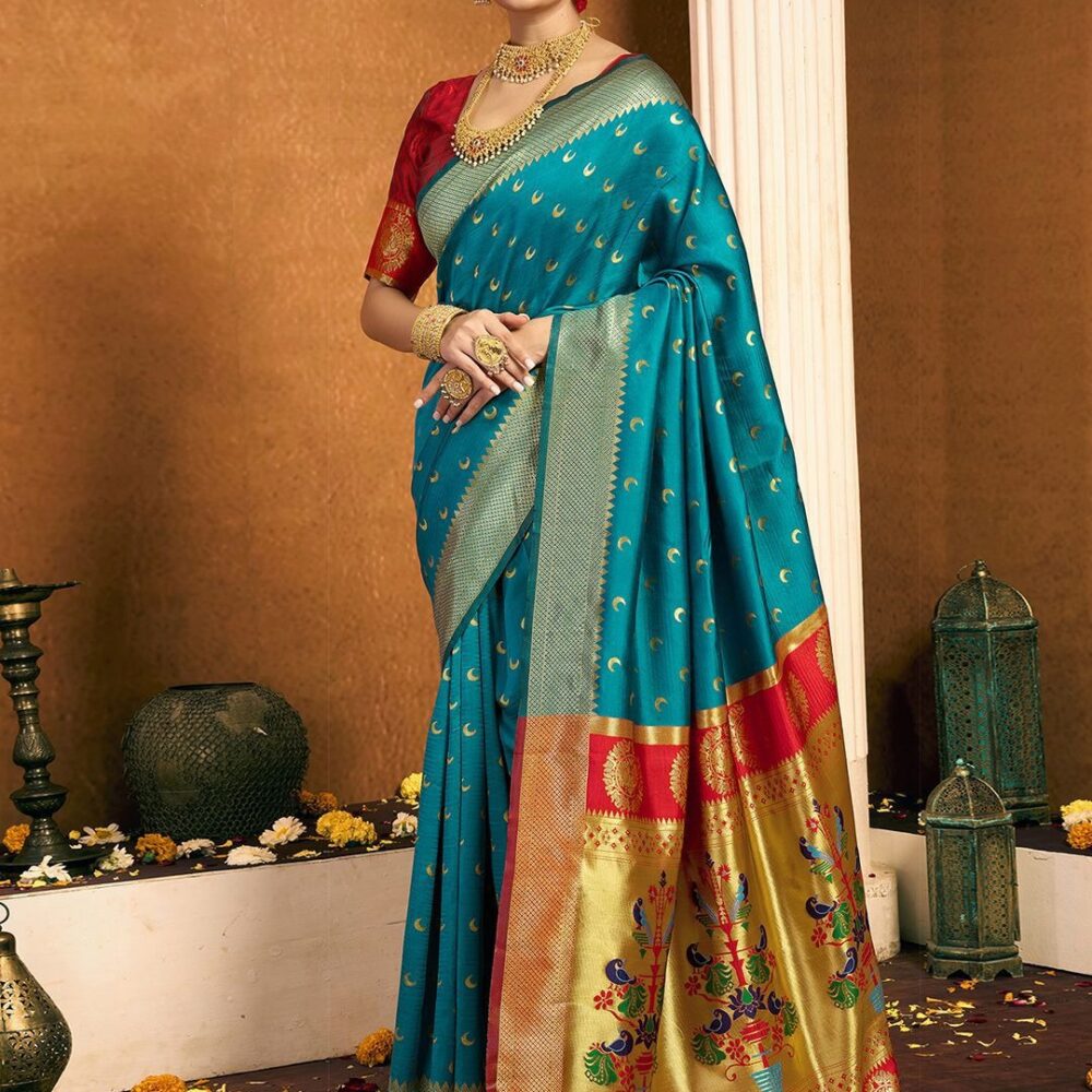 Product Details Design Details Green and gold-toned paithani saree Woven design saree with woven design border Has zari detail The saree comes with an unstitched blouse piece The blouse worn by the model might be for modelling purpose only. Check the image of the blouse piece to understand how the actual blouse piece looks like. Size & Fit Length: 5.5 metres plus 0.8 metre blouse piece Width: 1.06 metres (approx.) Material & Care Saree and Blouse Fabric : Silk Blend Hand Wash