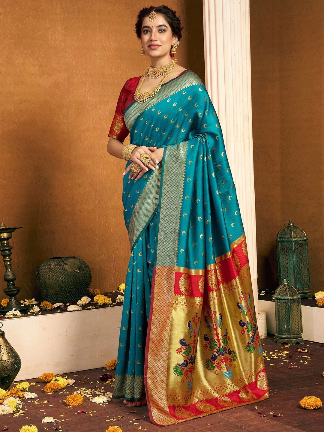 imgi_141_vstUljH6_d6d0292d55074565aaeb606a503f1610 Product Details Design Details Green and gold-toned paithani saree Woven design saree with woven design border Has zari detail The saree comes with an unstitched blouse piece The blouse worn by the model might be for modelling purpose only. Check the image of the blouse piece to understand how the actual blouse piece looks like. Size & Fit Length: 5.5 metres plus 0.8 metre blouse piece Width: 1.06 metres (approx.) Material & Care Saree and Blouse Fabric : Silk Blend Hand Wash
