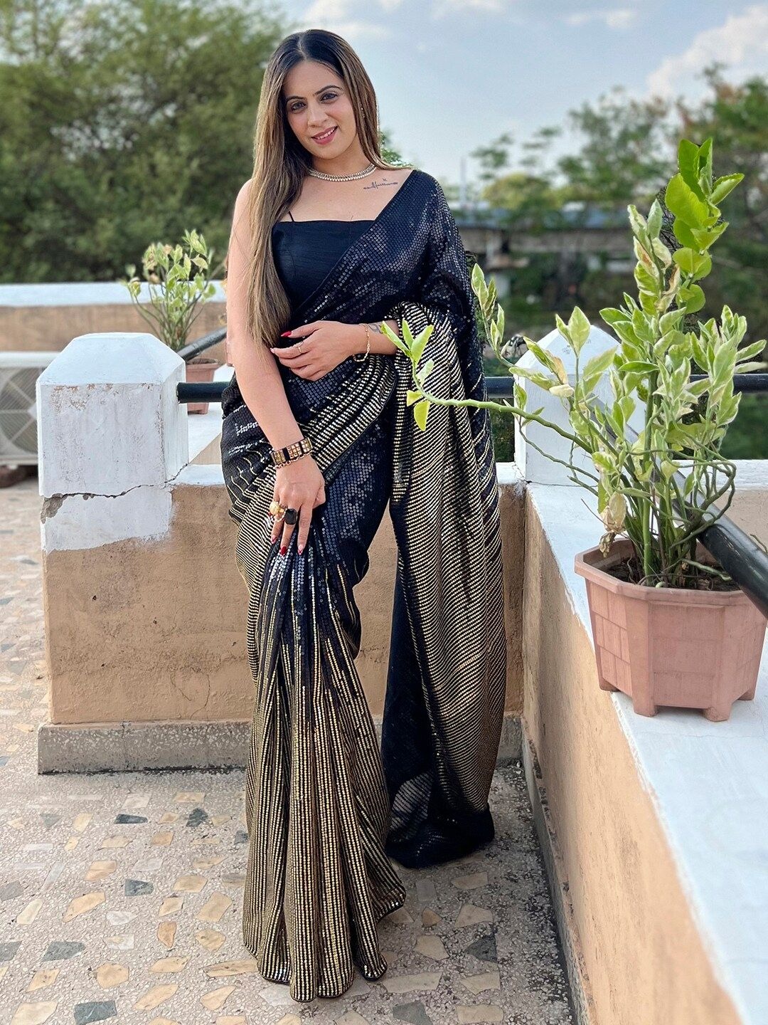 imgi_147_1aa9d7fc-f707-480a-801c-631d442fc1df1702564371671AnoukBlackGeorgetteEthnicEmbellishedPartyWearSareewithMatchi1 https://myntr.it/1Sc1SxQhttps://www.myntra.com/sarees/anouk/anouk-black-embellished-sequinned-pure-georgette-saree/26426754/buy
