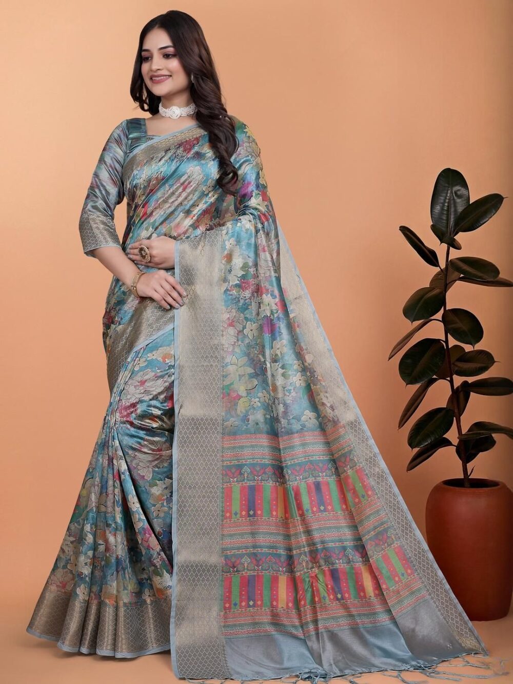 Product Details Women Blue Ethnic Motifs Zari Silk Blend Banarasi Saree With Blouse Piece Size & Fit Length: 5.5 metres plus 0.8 metre blouse piece Width: 1.06 metres (approx.) Material & Care fabric offers a luxurious feel with a smooth texture and a subtle sheen. The durability and comfort of blended fibers, making it lightweight, breathable, and easy to drape. This material ensures a refined look while maintaining ease of maintenance and wearability for various occasions.