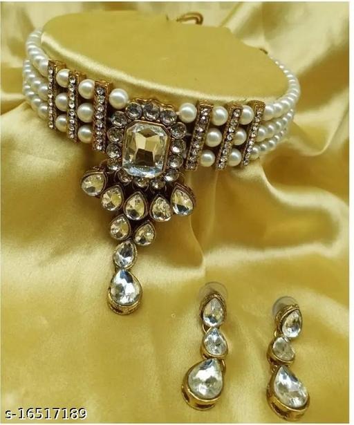 imgi_149_yhjhp_512 Jewellery Set is designed for women and girls who love timeless elegance blended with contemporary charm. Crafted with a durable alloy base and finished with luxurious gold plating, this set sparkles with artificial stones and beads that bring unmatched sophistication to any outfit. Whether youβre dressing for weddings, festive celebrations, parties, or everyday glam, this gold-plated jewellery set is the perfect accessory to make you shine. This versatile set pairs beautifully with sarees, lehengas, gowns, and Indo-western dresses, making it an essential addition to every jewellery collection. The artificial stone necklace set is not only stylish but also lightweight and comfortable for long wear. Ideal for brides, bridesmaids, and fashion-forward women, itβs a thoughtful gift for girls and women on birthdays, anniversaries, engagements, and festivals like Diwali and Karva Chauth. If youβre looking for affordable jewellery sets online, gold-plated artificial stone necklace sets, fashion jewellery for weddings, traditional beaded necklace sets, or stylish party wear jewellery for girls, the Feminine Chic Jewellery Set is your one-stop solution. Exclusively available at https://dealdynamo.vinisocial.in , this set reflects elegance, durability, and feminine grace all in one. πΉ Product Highlights β
 Base Metal: Alloy with premium gold plating β
 Studded with artificial stones & beads for a chic look β
 Necklace with matching design for complete styling β
 Lightweight, durable, and comfortable β
 Perfect for weddings, parties, and festive wear πΉ Variations & Uses Bridal jewellery set for weddings & receptions Party wear jewellery set for modern styling Festive necklace set for Diwali, Navratri, Karva Chauth Ideal gift jewellery set for women & girls πΉ Why Choose This Jewellery Set? β Elegant design with artificial stones & beads β Durable alloy base with luxurious gold plating β Lightweight and comfortable for long wear β Affordable yet classy for multiple occasions β Exclusive availability on https://dealdynamo.vinisocial.in πΉ Website & Ownership This jewellery set is listed exclusively on https://dealdynamo.vinisocial.in , curated and managed by Renu Baliyan, Nity Baliyan & Bharti Tomar. β¨ Keywords naturally embedded: Feminine chic jewellery set, gold plated artificial stone necklace set, beaded necklace set online India, bridal jewellery set for women, party wear jewellery set for girls, traditional gold plated beaded necklace, artificial stone choker set online, wedding necklace set for women India, affordable fashion jewellery set online, festive jewellery set for Diwali & Karva Chauth,