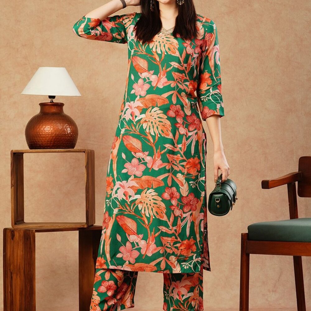 Product Details Green & pink printed Kurta with Palazzos Kurta design: Floral printed Straight shape Regular style V-neck, three-quarter regular sleeves Calf length with straight hem Cotton blend machine weave fabric Palazzos design: Solid Palazzos 1 Pocket Elasticated waistband Slip-on closure Size & Fit The model (height 5'8) is wearing a size S Material & Care Kurta Fabric: Cotton Blend Bottom Fabric: Cotton Blend Dry Clean Size Bust (in) Front Length (in) Sleeve-Length (in) To Fit Waist (in) Waist (in) Hips (in) Across Shoulder (in) Inseam Length (in) S 36.0 46.0 17.0 30.0 33.0 42.0 14.0 25.0 M 38.0 46.0 17.0 32.0 35.0 44.0 14.5 24.8 L 40.0 46.0 17.0 34.0 37.0 46.0 15.0 24.5 XL 42.0 46.0 17.0 36.0 39.0 48.0 15.5 24.3 XXL 44.0 46.0 17.0 38.0 41.0 50.0 16.0 24.0