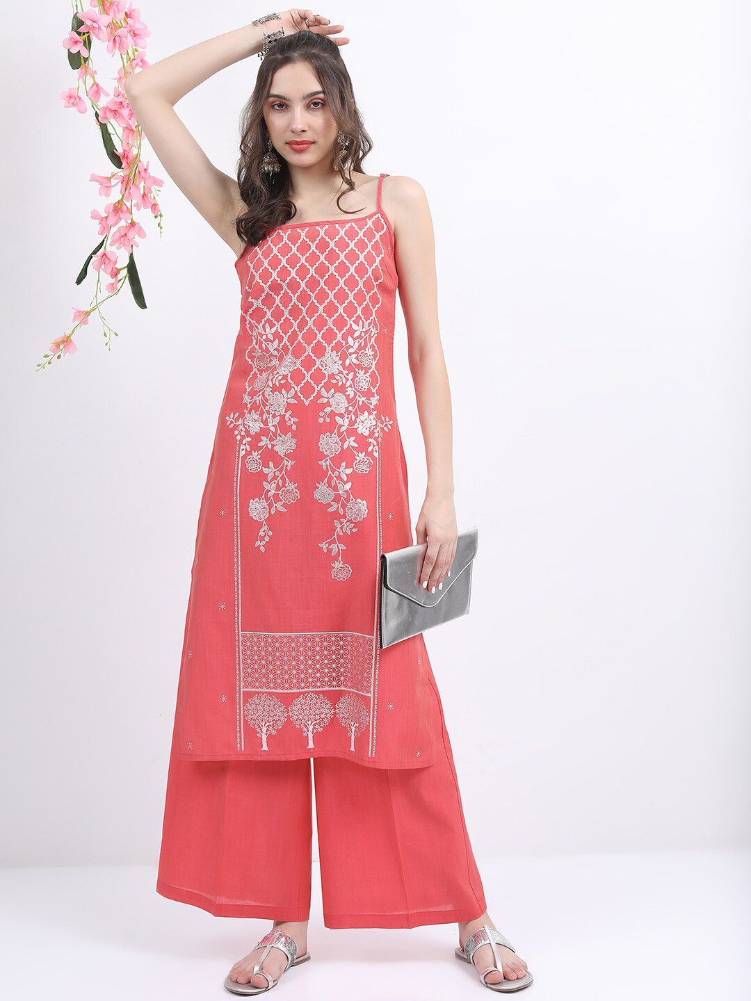 imgi_151_7ef185e7-cd89-4922-ae0b-435cf66225f51676390190137KurtaSets1 Product Details Pink printed Kurta with Palazzos Kurta design: Floral printed Straight shape Regular style Shoulder straps, sleeveless Calf length with straight hem Viscose rayon machine weave fabric Palazzos design: Solid Palazzos Elasticated waistband Slip-on closure Size & Fit The model (height 5'8) is wearing a size S Material & Care Top: Viscose Rayon Bottom: Viscose Rayon Machine Wash XL 40.5 44.0 32.0 36.5 46.0 14.5 39.0 27.0 XXL 42.5 44.0 34.0 38.5 48.0 15.0 39.3 27.0