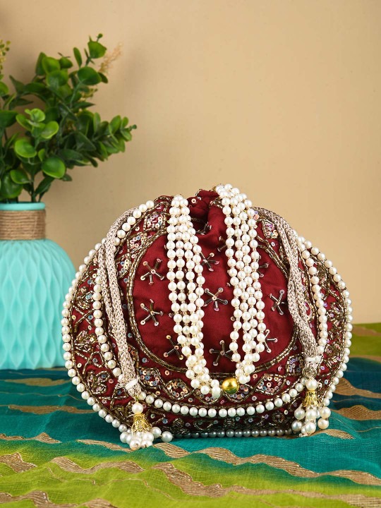 Anouk Maroon Embellished Potli Clutch | Deal Dynamo Shop Anouk Maroon Embroidered Embellished Potli Clutch at Deal Dynamo. Perfect ethnic, bridal, and festive accessory for weddings and parties. The Anouk Maroon Embroidered Embellished Potli Clutch is a stunning accessory designed for women seeking elegance for weddings, festive occasions, and parties. Made with premium fabric, the clutch features intricate embroidery, delicate beadwork, and embellishments that add a regal touch to your ethnic attire. Its drawstring closure with tassels ensures both security and style, while the spacious interior holds essentials such as mobile phones, cards, cash, and small makeup items. Lightweight and versatile, it pairs beautifully with sarees, lehengas, gowns, or anarkalis. Available exclusively at Deal Dynamo, this potli clutch makes an ideal gift and a statement accessory, combining style, convenience, and festive sophistication. The rich maroon tone enhances its elegance, making it a must-have addition to your ethnic wardrobe. Premium Fabric & Embellishments: Luxurious embroidery and beadwork for bridal and festive elegance. Tasselled Drawstring Closure: Securely holds essentials with decorative flair. Spacious Interior: Perfect for holding mobile, cash, cards, and small essentials. Lightweight & Portable: Comfortable to carry at weddings, parties, and celebrations. Durable Construction: Long-lasting for repeated use without wear. Versatile Design: Complements sarees, lehengas, gowns, and ethnic outfits. Perfect Gift Choice: Ideal for gifting during weddings or festive occasions. Exclusive at Deal Dynamo: Trusted source for authentic ethnic accessories. deal dynamo, deal dynamo shop, deal dynamo renu baliyan, dealdtnamo bharti tomar, deal dynamo nity baliyan, deal dynamo official, deal dynamo online, deal dynamo store, deal dynamo exclusive, deal dynamo fashion, deal dynamo ethnic, deal dynamo bridal, deal dynamo weddings, deal dynamo festive, deal dynamo clutch, deal dynamo potli, deal dynamo handbags, deal dynamo accessories, deal dynamo women, deal dynamo style, deal dynamo online shop, deal dynamo shopping, deal dynamo collection, deal dynamo designer, deal dynamo premium, deal dynamo luxury, deal dynamo partywear, deal dynamo ethnicwear, deal dynamo gifting, deal dynamo bestsellers, deal dynamo new arrivals, deal dynamo online store, deal dynamo fashion hub, deal dynamo boutique, deal dynamo trendy, deal dynamo chic, deal dynamo bridal clutch, deal dynamo velvet potli, deal dynamo tasselled clutch, deal dynamo embroidery, deal dynamo festive clutch, deal dynamo party clutch, deal dynamo wedding clutch, deal dynamo designer clutch, deal dynamo festive bag, deal dynamo ethnic bag, deal dynamo exclusive collection, deal dynamo premium bag, deal dynamo gifting ideas, deal dynamo women accessories, deal dynamo online exclusive, deal dynamo bridal collection, deal dynamo wedding accessories, deal dynamo ethnic accessories, deal dynamo online fashion, deal dynamo trend, deal dynamo top picks, deal dynamo party collection, deal dynamo luxury collection, deal dynamo festive collection, deal dynamo ethnic collection, deal dynamo online boutique, deal dynamo exclusive offers, deal dynamo gift ideas, deal dynamo festive gifting, deal dynamo partywear clutch, deal dynamo weddings collection, deal dynamo premium fashion, deal dynamo ethnic wedding clutch, deal dynamo womenβs bag, deal dynamo designer potli, deal dynamo ethnic potli, deal dynamo bridal potli, deal dynamo velvet clutch, deal dynamo tasselled potli, deal dynamo embellished clutch, deal dynamo festive potli, deal dynamo partywear potli, deal dynamo wedding bag, deal dynamo online shopping hub, deal dynamo official store, deal dynamo fashion store, deal dynamo exclusive accessories, deal dynamo top trending, deal dynamo shop online, deal dynamo festive handbags, deal dynamo online exclusive clutch, deal dynamo gifting clutch, deal dynamo bridal gift, deal dynamo wedding gift, deal dynamo party gift, deal dynamo women fashion, deal dynamo ethnic wear bag, deal dynamo traditional clutch, deal dynamo statement clutch, deal dynamo designer bag, deal dynamo stylish clutch, deal dynamo trendy handbag, deal dynamo exclusive fashion, deal dynamo boutique bag, deal dynamo online boutique clutch, deal dynamo party clutch bag, deal dynamo ethnic designer, deal dynamo festive exclusive Buy Anouk maroon embroidered embellished potli clutch online at Deal Dynamo, Anouk maroon bridal potli clutch wedding accessory Deal Dynamo shop, Designer Anouk embroidered potli clutch festive bag Deal Dynamo Renu Baliyan, Party wear Anouk maroon potli clutch embroidered handbag Dealdtnamo Bharti Tomar, Bridal embellished Anouk potli clutch wedding accessory Deal Dynamo Nity Baliyan, Anouk festive potli clutch embroidered bridal bag Deal Dynamo, Velvet tasselled Anouk maroon potli clutch bridal handbag Deal Dynamo shop, Premium Anouk embroidered potli clutch party accessory Deal Dynamo Renu Baliyan, Buy bridal embroidered Anouk maroon tasselled potli clutch at Dealdtnamo Bharti Tomar, Stylish Anouk embroidered velvet potli clutch festive look Deal Dynamo Nity Baliyan, Wedding ethnic Anouk embroidered potli clutch Deal Dynamo, Anouk bridal embellished potli clutch handbag collection Deal Dynamo shop, Tasselled Anouk potli clutch handbag for ethnic occasions Deal Dynamo Renu Baliyan, Buy bridal embellished Anouk potli clutch at Dealdtnamo Bharti Tomar, Designer Anouk embroidered potli clutch online Deal Dynamo Nity Baliyan, Anouk maroon embroidered potli clutch for festive weddings Deal Dynamo, Anouk embroidered potli clutch bridal velvet bag online Deal Dynamo shop, Ethnic fashion Anouk velvet potli clutch embroidered party bag Deal Dynamo Renu Baliyan, Stylish party tasselled clutch by Anouk potli collection Deal Dynamo Bharti Tomar, Tasselled embroidered Anouk potli clutch festive ethnic bag Deal Dynamo Nity Baliyan, Buy Anouk embroidered velvet potli clutch bridal bag online Deal Dynamo, Embroidered ethnic potli clutch by Anouk festive collection Deal Dynamo shop, Exclusive Anouk embroidered velvet potli clutch ethnic party bag Deal Dynamo Renu Baliyan, Festive embellished clutch potli handbag by Anouk for women Dealdtnamo Bharti Tomar, Buy Anouk designer embroidered potli clutch festive accessory online Deal Dynamo Nity Baliyan, Stylish embellished potli clutch Anouk handbag bridal wedding bag Deal Dynamo, Wedding collection Anouk embroidered potli clutch bridal handbag Deal Dynamo shop, Stylish Anouk clutch embellished potli bag festive look Deal Dynamo Renu Baliyan, β¦