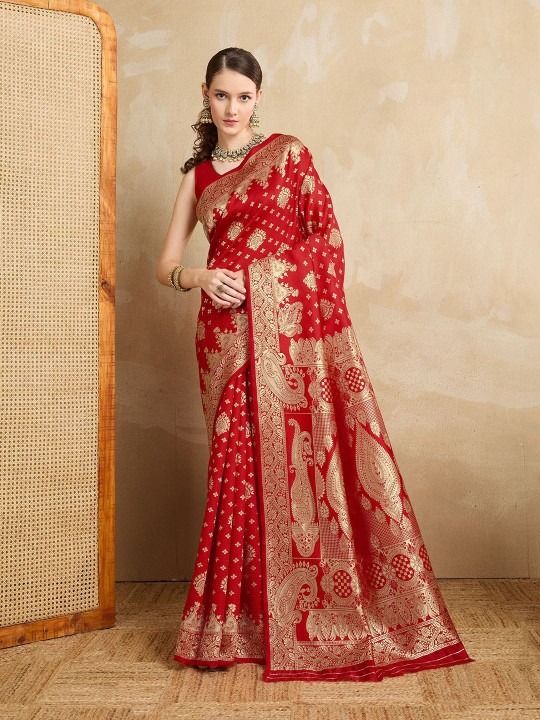 Product Details Design Details Maroon and gold-toned banarasi saree Woven design saree with woven design border border Has zari detail The saree comes with an unstitched blouse piece The blouse worn by the model might be for modelling purpose only. Check the image of the blouse piece to understand how the actual blouse piece looks like. Size & Fit Length: 5.5 metres plus 0.8 metre blouse piece Width: 1.06 metres (approx.) Material & Care Silk Blend Dry Clean