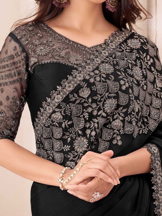 imgi_72_tIjOf9k1_32412926b04944af849a8cbd557c2ad0 Product Details Design Details Black and grey saree Solid saree with embellished border border Has sequinned detail The saree comes with an unstitched blouse piece The blouse worn by the model might be for modelling purpose only. Check the image of the blouse piece to understand how the actual blouse piece looks like. Size & Fit Length: 5.5 metres plus 0.8 metre blouse piece Width: 1.06 metres (approx.) Material & Care Dry Clean
