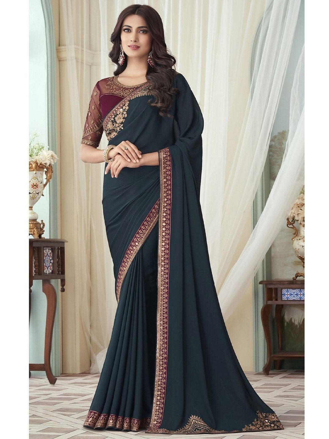 imgi_75_57815a93-0031-4616-a189-9ac95846f5501680279742018TealEmbroideryWorkSareeWithUnstitchedBlousePiece1 Buy Silk Blend Sarees & Dresses online at DealDynamo. Premium fabric, elegant designs, and festive looks – shop now at the best price.