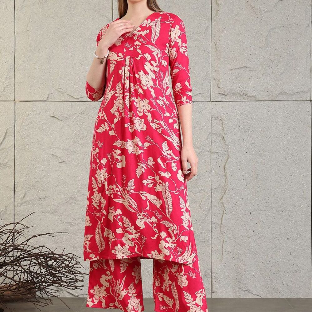 Product Details Black printed Kurta with Palazzos Kurta design: Floral printed Straight shape Regular style V-neck, three-quarter regular sleeves 1 pockets Calf length length with straight hem Viscose rayon machine weave fabric Palazzos design: Printed Palazzos Elasticated waistband Slip-on closure Size & Fit The model (height 5'8) is wearing a size S Material & Care Rayon Size Bust (in) Front Length (in) Sleeve-Length (in) To Fit Waist (in) Waist (in) Hips (in) Across Shoulder (in) Inseam Length (in) XS 34.0 46.0 16.0 26.0 26.0 34.0 13.5 28.0 S 36.0 46.0 16.0 28.0 28.0 36.0 14.0 28.0 M 38.0 46.0 16.0 30.0 30.0 38.0 14.5 28.0 L 40.0 46.0 16.0 32.0 32.0 40.0 15.0 28.0 XL 42.0 46.0 16.0 34.0 34.0 42.0 15.5 28.0 XXL 44.0 46.0 16.0 36.0 36.0 44.0 16.0 28.0