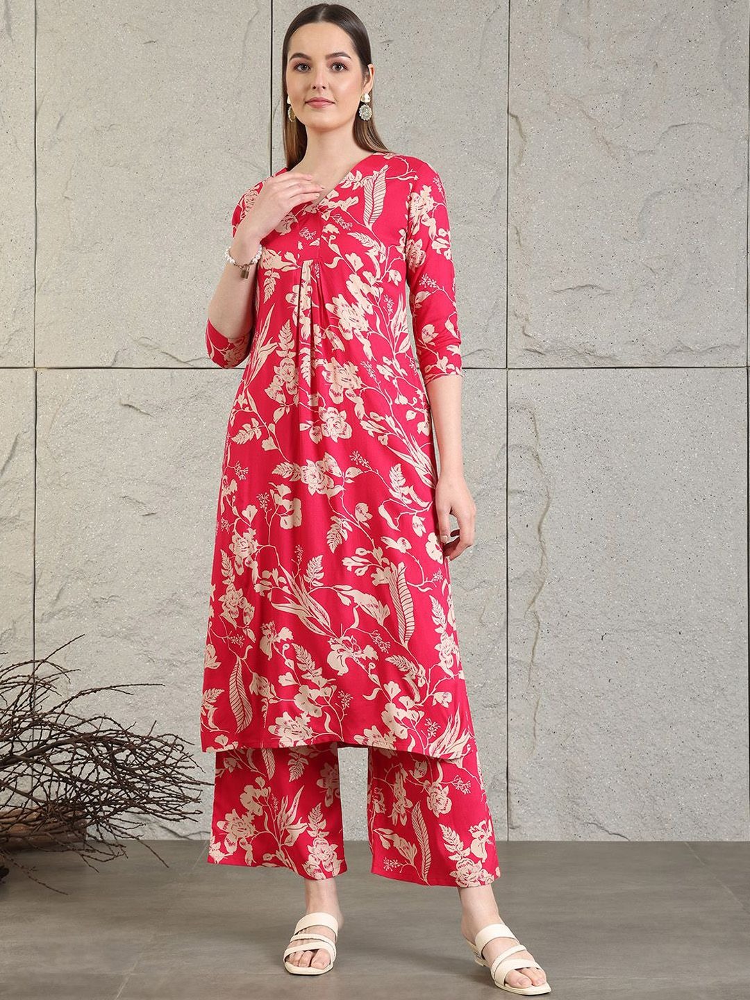 imgi_77_019bbc71-39a0-4ecb-bd36-b50faaf1869f1736246615671KALINIWomenFloralPrintedRegularKurtawithPalazzos1 Product Details Black printed Kurta with Palazzos Kurta design: Floral printed Straight shape Regular style V-neck, three-quarter regular sleeves 1 pockets Calf length length with straight hem Viscose rayon machine weave fabric Palazzos design: Printed Palazzos Elasticated waistband Slip-on closure Size & Fit The model (height 5'8) is wearing a size S Material & Care Rayon Size Bust (in) Front Length (in) Sleeve-Length (in) To Fit Waist (in) Waist (in) Hips (in) Across Shoulder (in) Inseam Length (in) XS 34.0 46.0 16.0 26.0 26.0 34.0 13.5 28.0 S 36.0 46.0 16.0 28.0 28.0 36.0 14.0 28.0 M 38.0 46.0 16.0 30.0 30.0 38.0 14.5 28.0 L 40.0 46.0 16.0 32.0 32.0 40.0 15.0 28.0 XL 42.0 46.0 16.0 34.0 34.0 42.0 15.5 28.0 XXL 44.0 46.0 16.0 36.0 36.0 44.0 16.0 28.0
