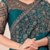 imgi_79_qShgsci0_7044871b02a84d8d81834e46bce8e951 Product Details Design Details Black and grey saree Solid saree with embellished border border Has sequinned detail The saree comes with an unstitched blouse piece The blouse worn by the model might be for modelling purpose only. Check the image of the blouse piece to understand how the actual blouse piece looks like. Size & Fit Length: 5.5 metres plus 0.8 metre blouse piece Width: 1.06 metres (approx.) Material & Care Dry Clean