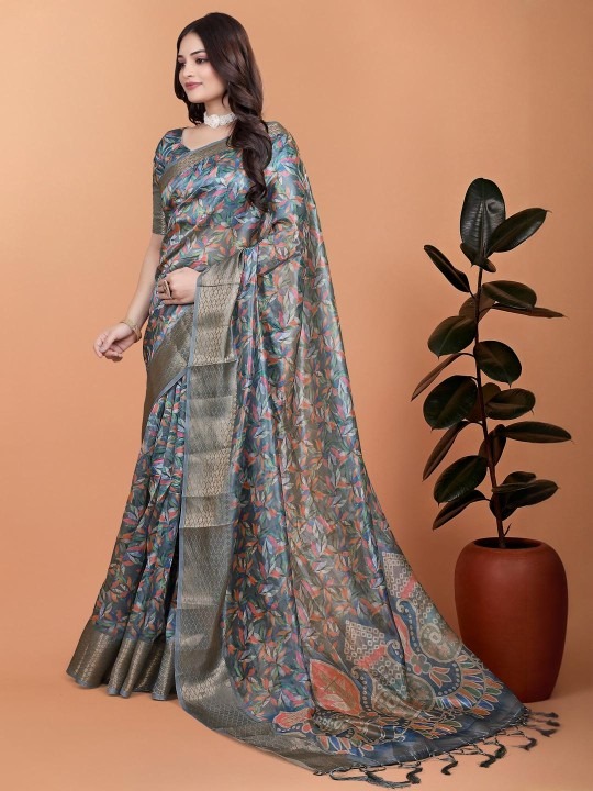 Product Details Women Blue Ethnic Motifs Zari Silk Blend Banarasi Saree With Blouse Piece Size & Fit Length: 5.5 metres plus 0.8 metre blouse piece Width: 1.06 metres (approx.) Material & Care fabric offers a luxurious feel with a smooth texture and a subtle sheen. The durability and comfort of blended fibers, making it lightweight, breathable, and easy to drape. This material ensures a refined look while maintaining ease of maintenance and wearability for various occasions.